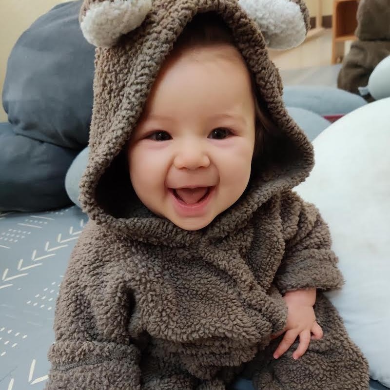 cute tot looking happy