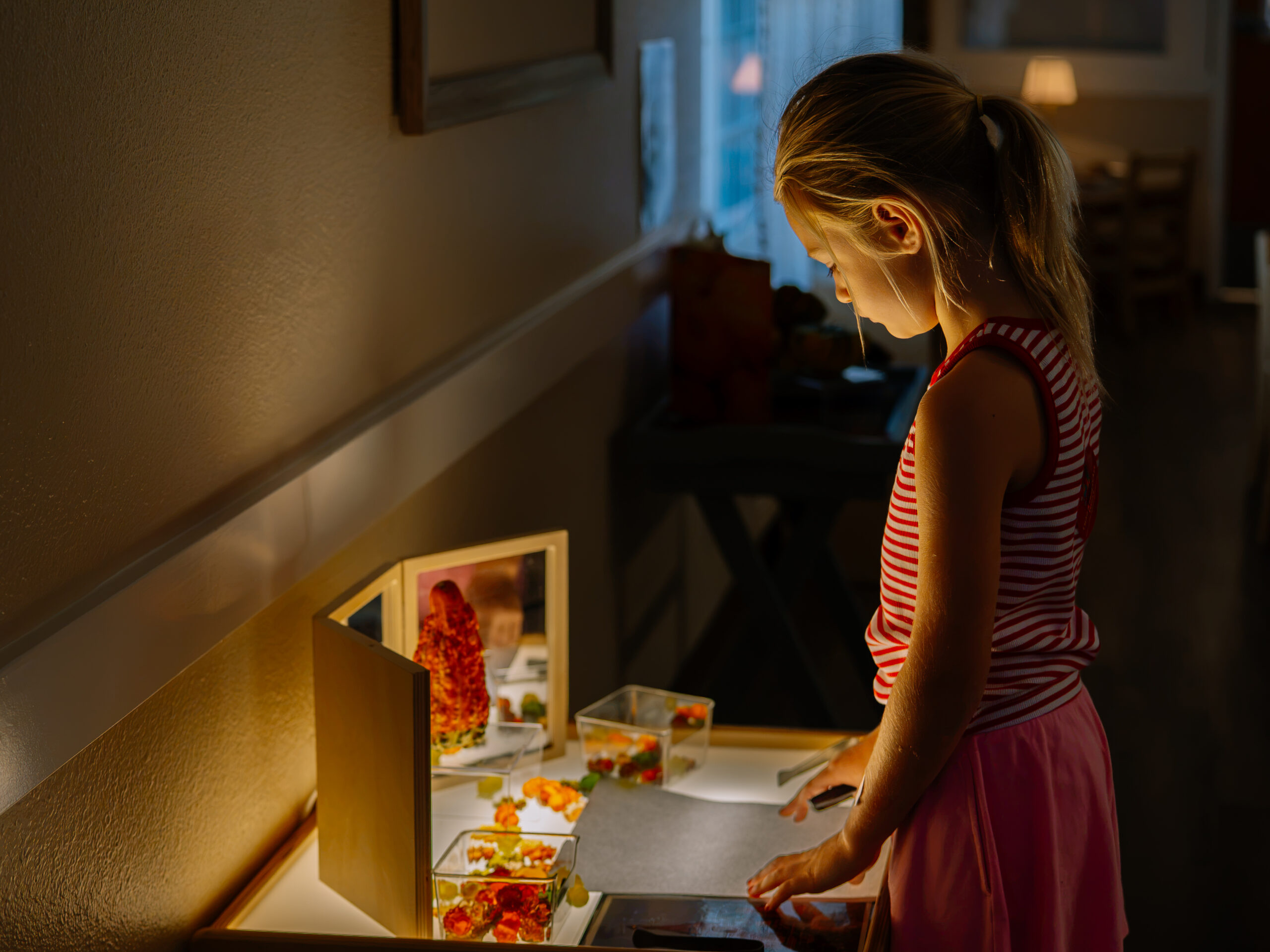 child with light table